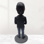 Personalisierte Geschäftsfigur mit Globus